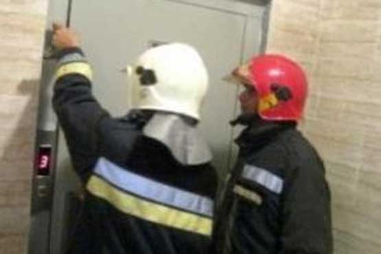 آسانسور,مرد میانسال,آتش نشانی