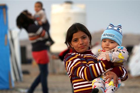 داعش خطاب به خانواده‌های موصلی:فرار کنید، کودکانتان را می‌کشیم