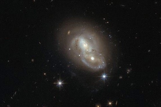 2 کهکشان به هم برخورد می کنند + عکس