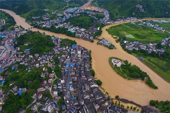 2 کشته و 470 هزار آسیب‌دیده بر اثر بارندگی در چین +عکس