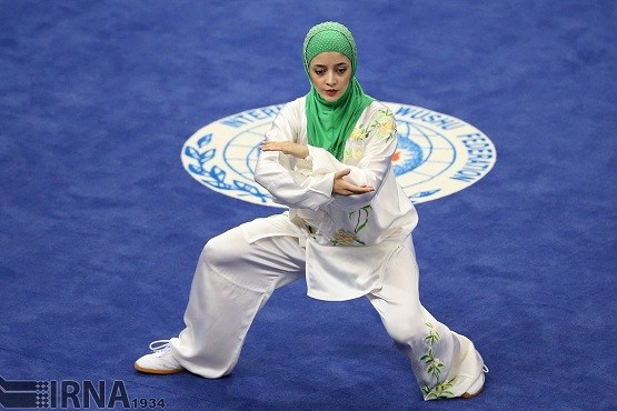 تصاویر زیبا از حرکات ووشو کار زن ایرانی در رقابتهای  اینچئون