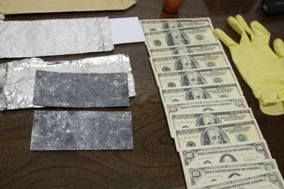 فروشنده دلارهای تقلبی در کرج دستگیر شد