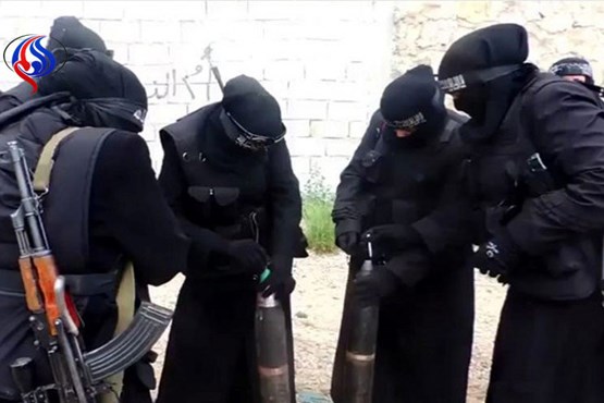 اجبار زنان توسط داعش برای بریدن سر فراریان در موصل