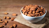 بیش از ۵۰ خاصیت شگفت‌انگیز و فواید بادام برای سلامت قلب، پوست و مو