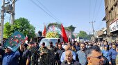 تشییع سپهبد شهید غلامعلی رشید و فرزندش و سردار نصیر باغبان بر دستان خوزستانی‌ها