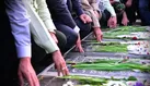 آیین بزرگداشت و گلباران قبور شهدای هفتم تیر در قم برگزار شد