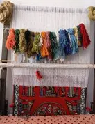 برگزاری  ۱۴ دوره آموزش ارتقای مهارت قالی بافان در استان ایلام